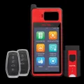 Autel MaxiIM KM100 key programmer, red and black 5.5-inch handheld front view with the main menu on screen 3